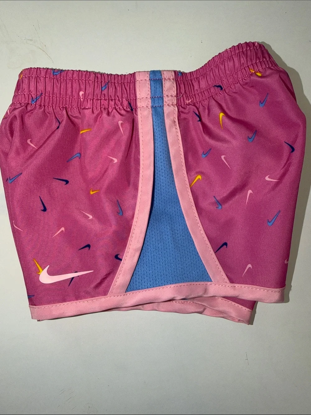 Nike Pink Girls' Shorts with Blue Panels and Multi-Color Swooshes